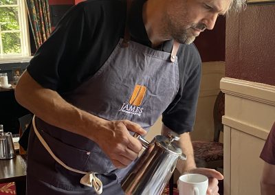 Peter James, James Gourmet Coffee pouring a cafetiere