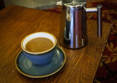 Cup and coffee on table